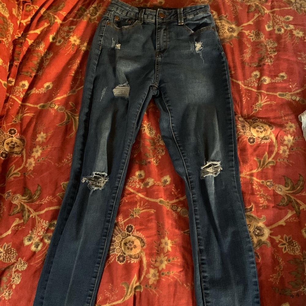 Distress blue jeans